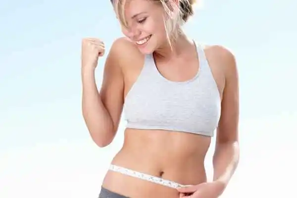 woman happy after fat reduction treatment St Ives